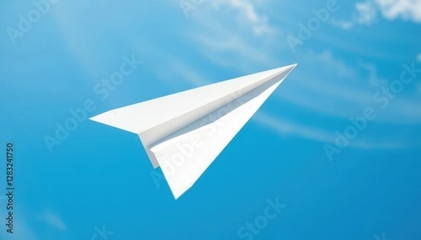 Fototapeta Photorealistic close-up of a perfectly folded white paper airplane - mockup for text or logo, soaring against a clear blue sky. The sky is a clear, graduated blue with a few wispy cirrus clouds high