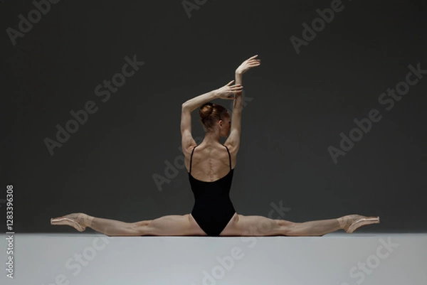 Obraz Young beautiful ballerina is posing in studio