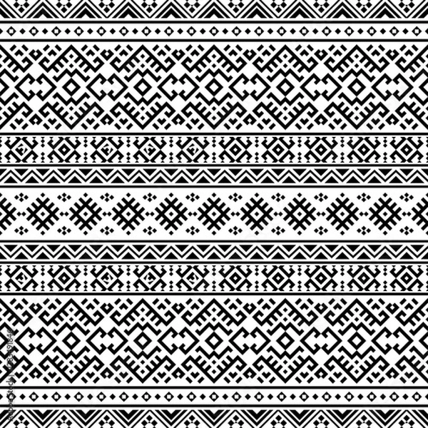 Fototapeta A modern yet traditional black and white seamless geometric pattern with horizontal symmetry. Inspired by Aztec and Inca art, perfect for fashion, branding, and decorative projects.