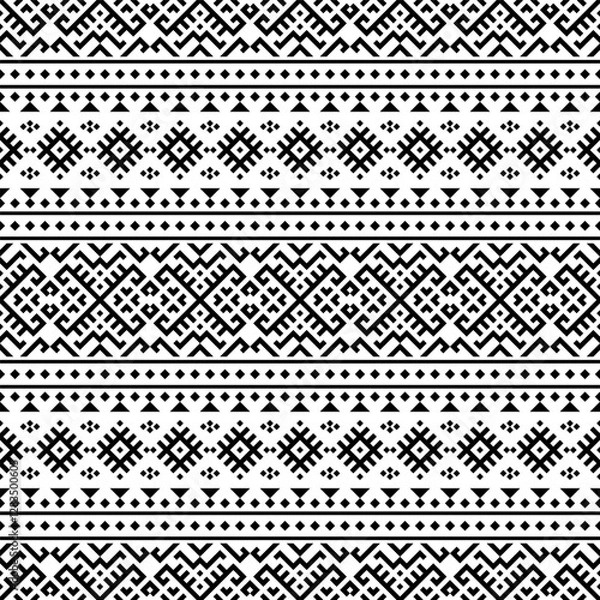 Fototapeta A striking horizontal seamless pattern with intricate tribal-inspired geometric designs in black and white. Great for branding, packaging, and home decor.
