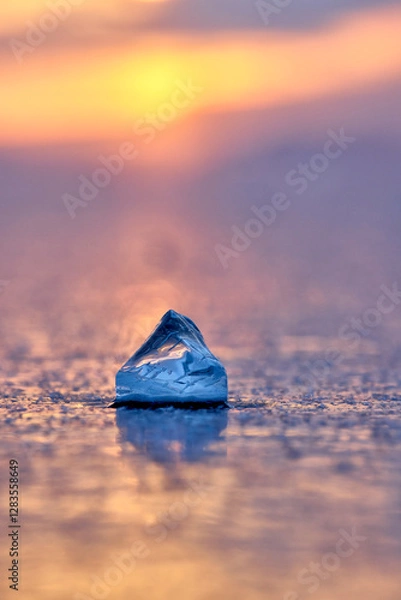 Fototapeta Transparent ice floe on the background of sunset on Lake Baikal
