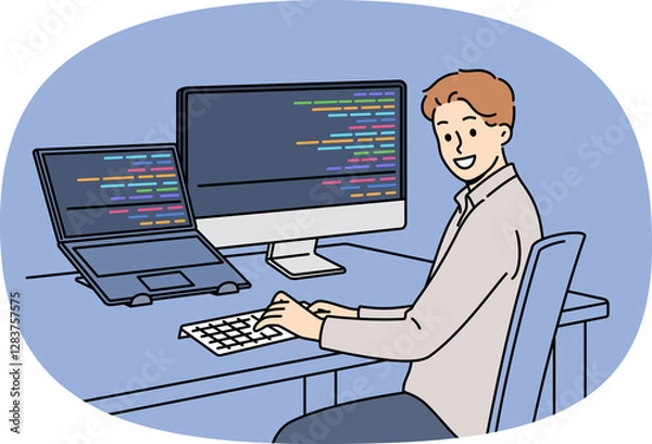 Fototapeta Man programmer types code and looks at camera, sitting at table with computer and laptop. Successful guy programmer develops software or application, working in team with UI or UX designers