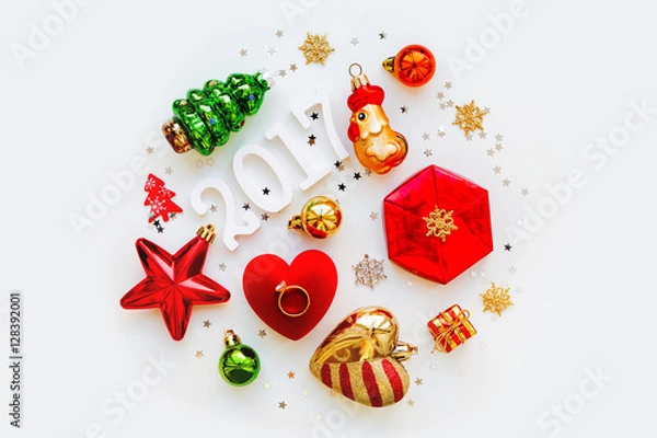 Fototapeta Christmas and New Year 2017 background with decorations, shaped as a circle. Symbol of year - Fire Rooster.