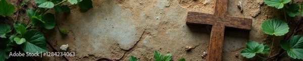Fototapeta Wooden cross placed atop a worn stone surface with vines, rustic_d?cor, ancient_artifacts