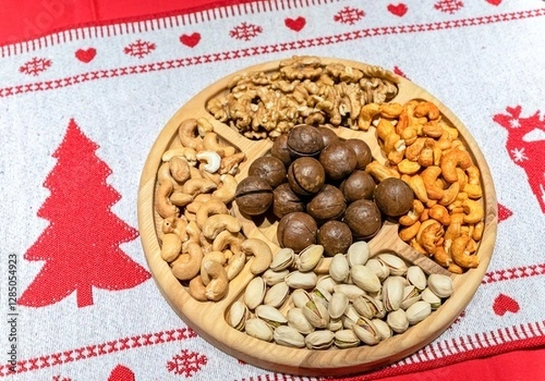 Fototapeta There are nuts on the table for the New Year