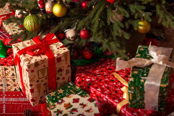 Obraz Christmas gifts under the tree. New Year home interior