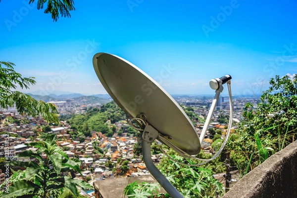 Obraz Satellite dish, antenna on the background of slum houses
