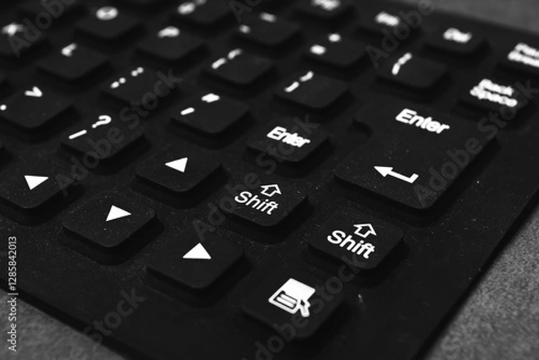 Fototapeta Silicone keyboard keys on a gray background
