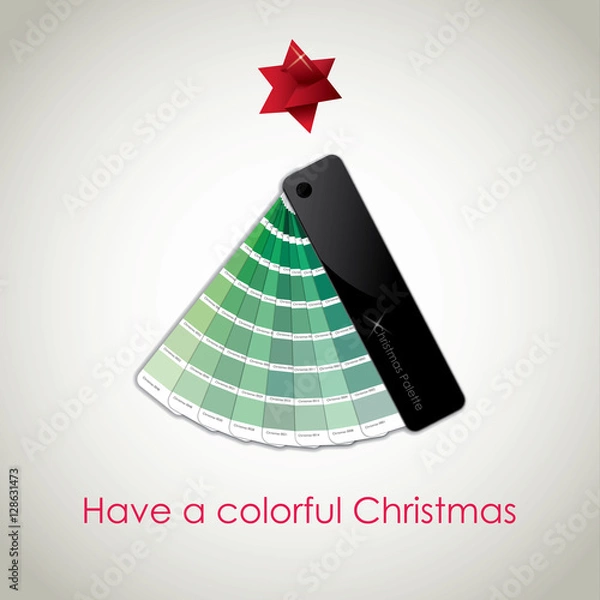 Fototapeta Conceptual Christmas Card: a Christmas tree made by a green colors palette, with a red origami star on the top, with a Christmas wish on the bottom