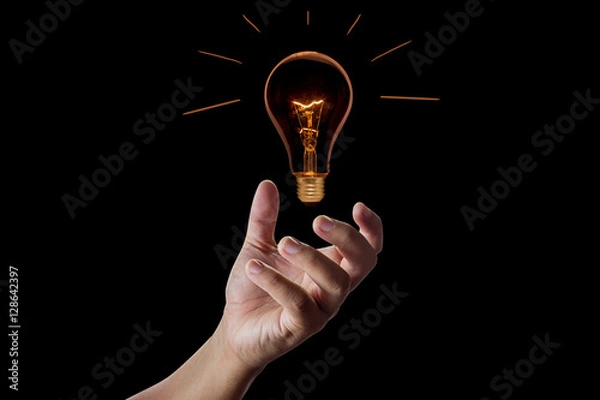 Obraz Hand with incandescent bulbs