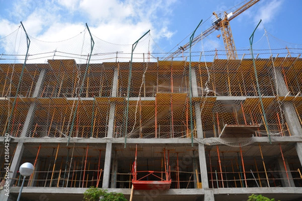 Fototapeta andamios en un edificio en obras