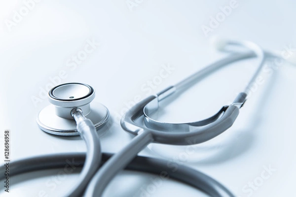 Obraz Stethoscope on blue background