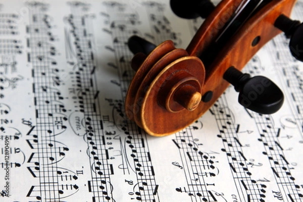 Obraz violin scroll on sheet music