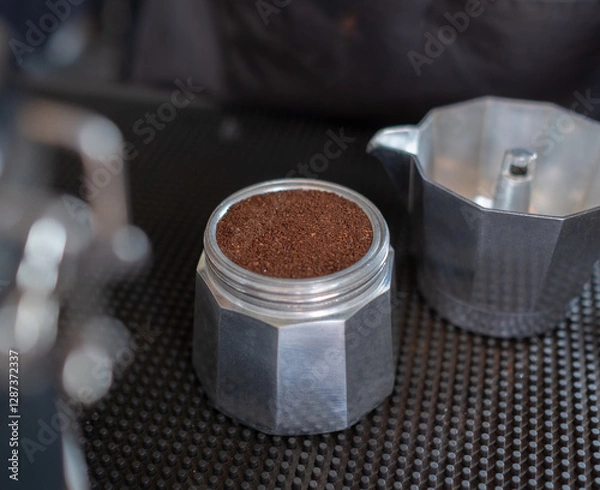 Fototapeta Espresso in Moka pot coffee on table.