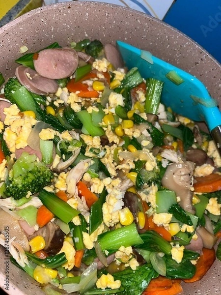 Fototapeta Freshly Cooked Capcay (Sayur Oseng) Stir-Fry in a Pan on the Stove