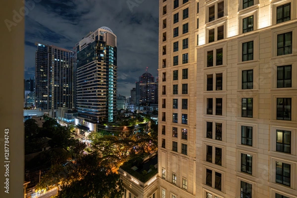 Obraz Big city view - Bangkok at night - skyscrapers and clouds in the sky