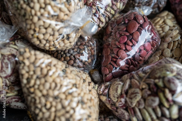 Obraz Bags of nuts and seeds sold at a local thai market