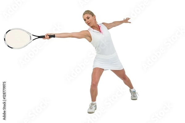 Fototapeta Athlete playing tennis with a racket 