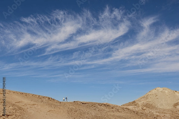 Fototapeta Two with a dog and the sky to the horizon. Above the Gishron Gorge