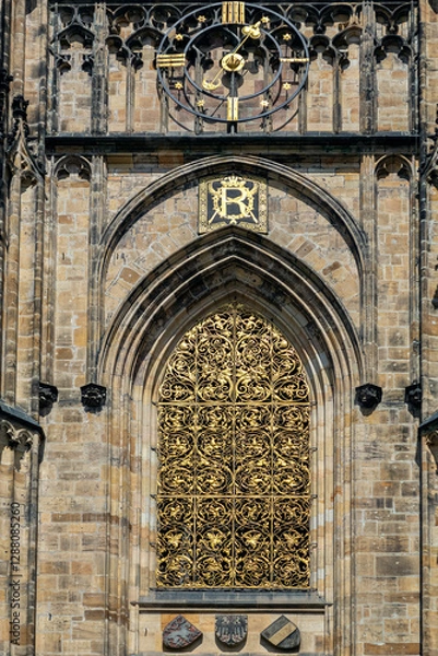 Fototapeta Arched window with golden lattice on the Basilica of St. George in Prague Castle. From the series of windows of the World.
