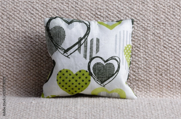 Obraz Cushion with heart shapes on sofa