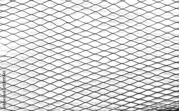 Fototapeta Plastic mesh / View of plastic mesh on white background.