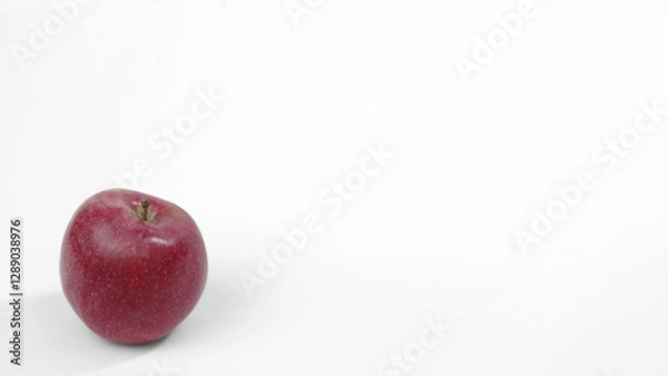 Fototapeta Red apple isolated on a white background. Panoramic photo.