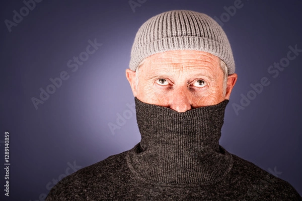 Fototapeta Mann mit Mütze und Rollkragenpullover