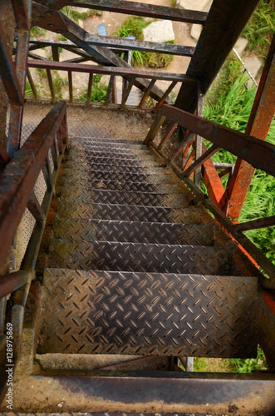 Fototapeta rusty and old looking tower staircase
