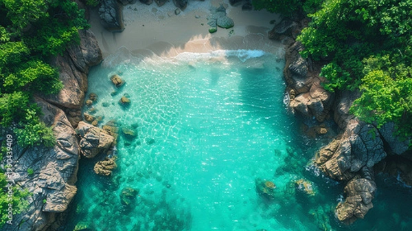 Fototapeta Secret Haven: Birds-Eye View of a Hidden Beach Between Two Cliffs