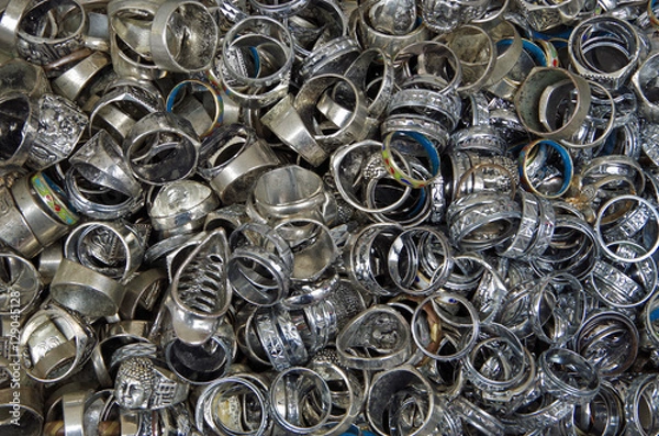 Fototapeta Mixed metallic rings in pile close-up 