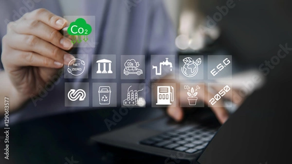 Fototapeta ESG environment social governance investment business concept. A person using laptop with net zero, co 2 concept with visual screen.