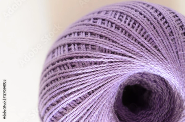 Obraz Closeup of purple thread spool with detailed texture