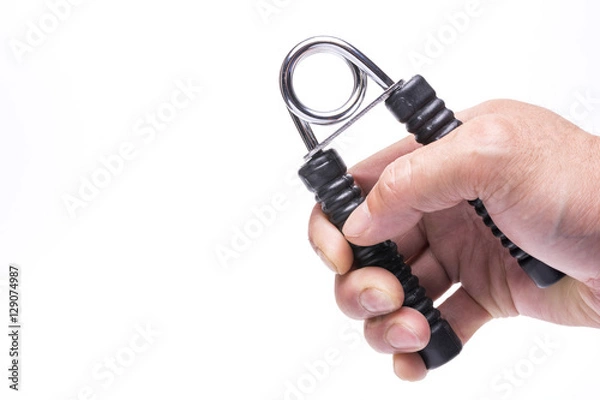 Obraz ハンドグリッパーを握る手