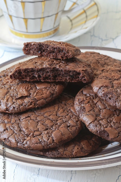 Obraz Fudge brownie cookies on crockery plate and cup