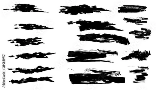 Fototapeta Collection of expressive black brushstrokes and ink splatters on a clean white background, creating dynamic textured elements for artistic compositions