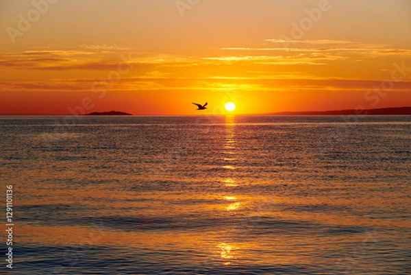 Fototapeta Dawn on Lake Alakol. Lake Alakol is a salt lake located in the Zhetysu and Abay regions of the Republic of Kazakhstan. Blur effect.