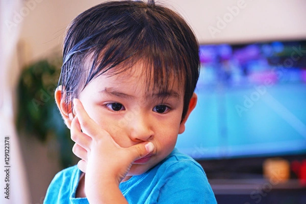 Obraz 不機嫌な男の子