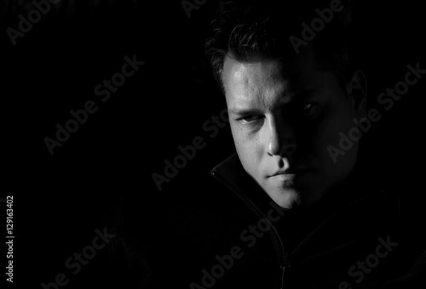 Obraz Portrait of young man monochrome