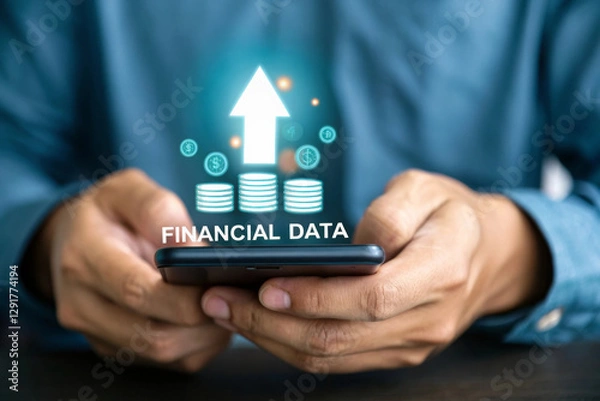 Fototapeta Managing finances on smartphone, showing financial data growth with charts and currency symbols. This captures essence of modern financial management