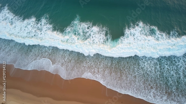 Fototapeta waves on a sandy beach