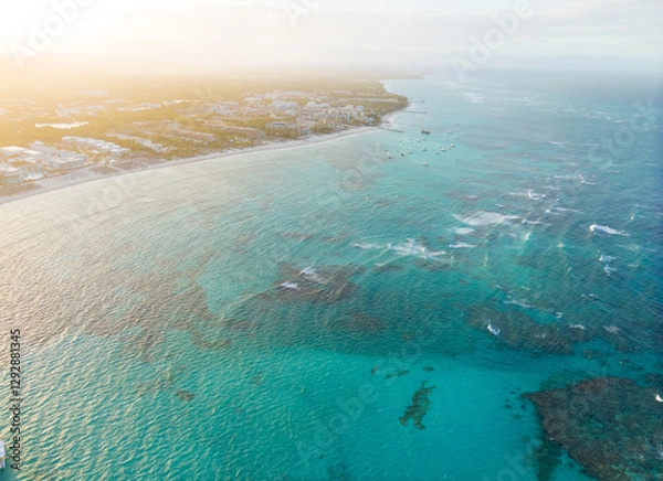 Obraz A beautiful blue ocean with a few boats in the water