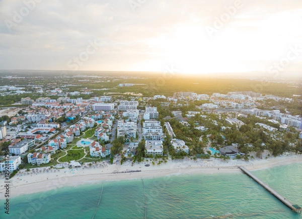 Obraz A beach with a city in the background