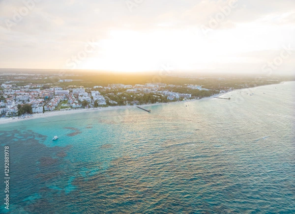 Obraz A beautiful blue ocean with a city in the background