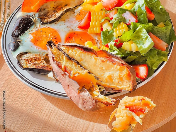 Obraz Sunny side up eggs with vegetables and sweet potato for breakfast. Delicious food.Cooking recipes. Healthy meal.Diet food.Healthy recipes.Diet food dish. Protein egg.