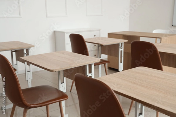 Fototapeta Interior of empty classroom with school desks