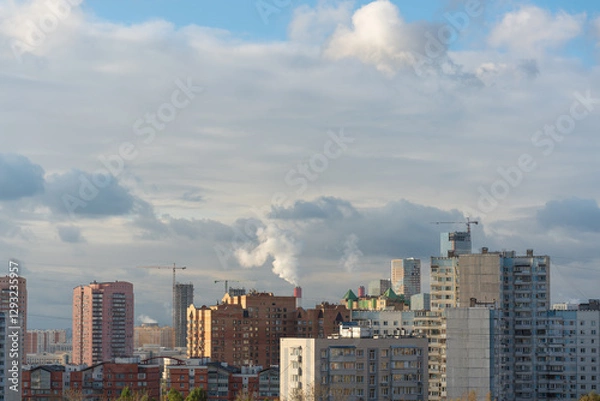 Fototapeta City beautiful landscape - panoramic view of residential multi-storey modern buildings among autumn trees on a sunny October day in the west of Moscow. High quality photo