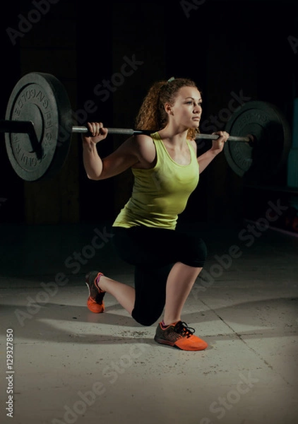 Obraz Woman Lifting Weight. Crossfit.