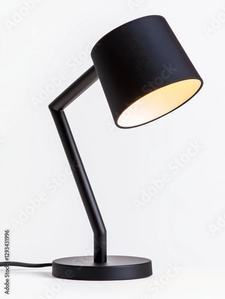 Fototapeta Black desk lamp with cylindrical shade, matte black finish, modern minimalist design, warm light, simple base, on white background