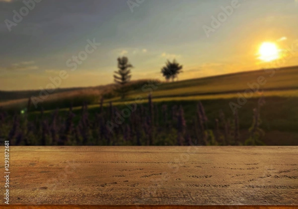 Fototapeta Wooden table top on blur mountain and grass field.Fresh and Relax concept.For montage product display or design key visual layout.View of copy space.
